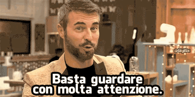 a man with a beard says basta guardare con molta attenzione
