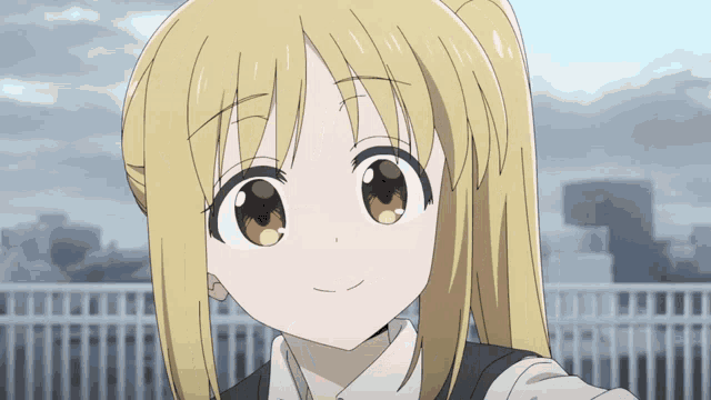 a girl with blonde hair and red eyes looks at the camera