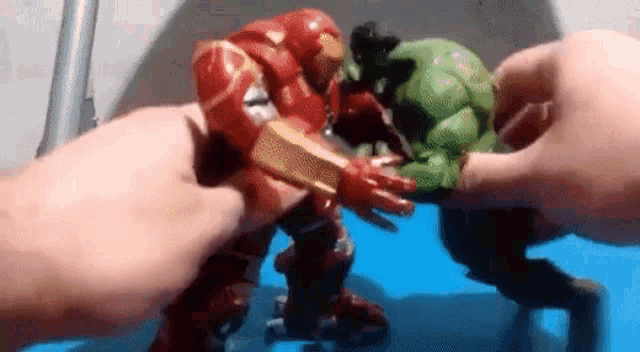 Action Figure Fight GIF - Action Figure Fight Iron Man GIFs