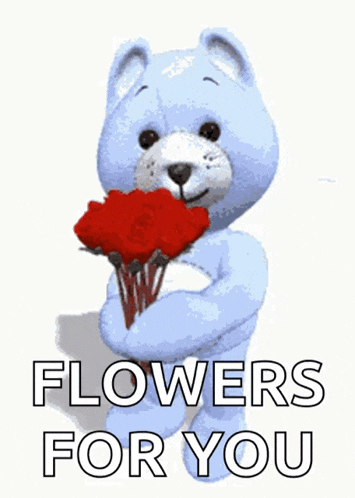 a blue teddy bear holding a bouquet of red roses with the words flowers for you written below it