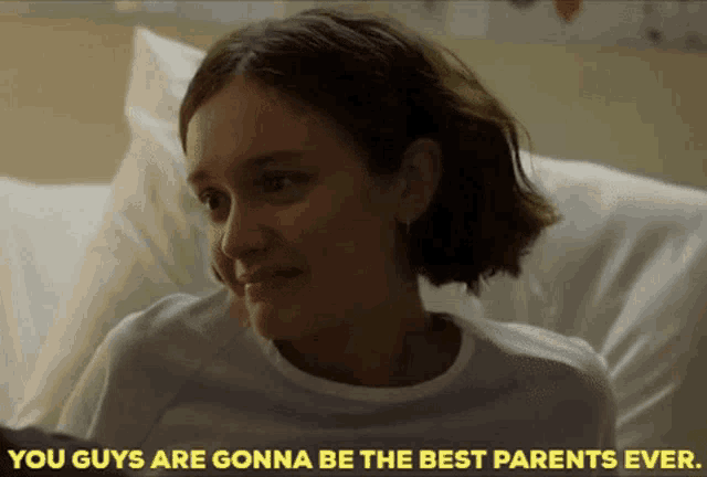 a woman in a hospital bed with the words " you guys are gonna be the best parents ever " behind her
