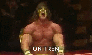 a muscular wrestler is sitting in a ring with his mouth open and the words `` on tren '' written on the bottom .