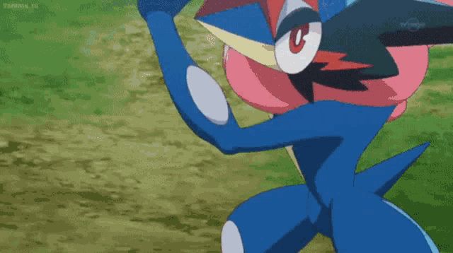 a close up of a cartoon character with a red eye and a blue body .