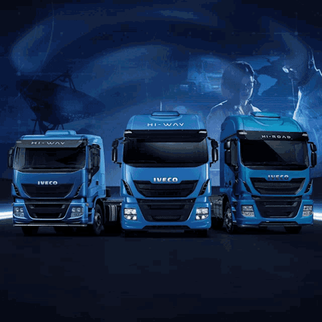three blue iveco trucks are lined up in front of a blue background that says cia verde iveco