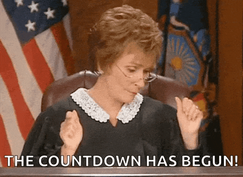 a woman in a judge 's chair with the words " the countdown has begun " behind her