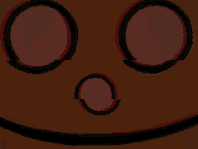 a smiley face with green and pink circles