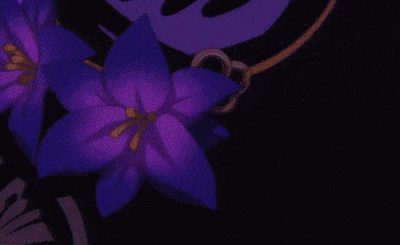a close up of a person wearing a hat with a flower on it