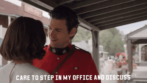 a man in a red uniform with the words care to step in my office and discuss on the bottom
