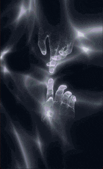 a person 's hand is reaching out towards another person 's hand in the dark