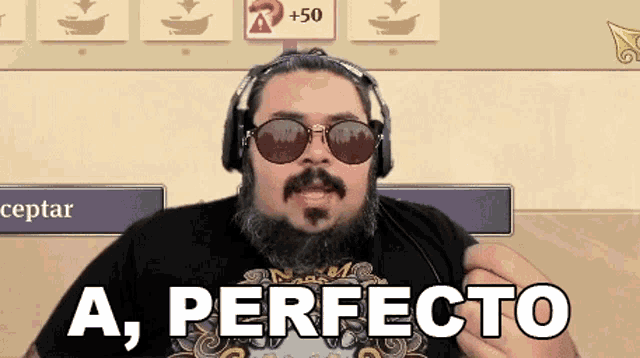 a man with a beard wearing sunglasses and headphones says a perfecto