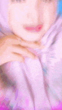a blurred image of a woman wearing a hijab with the words welcome on the bottom right