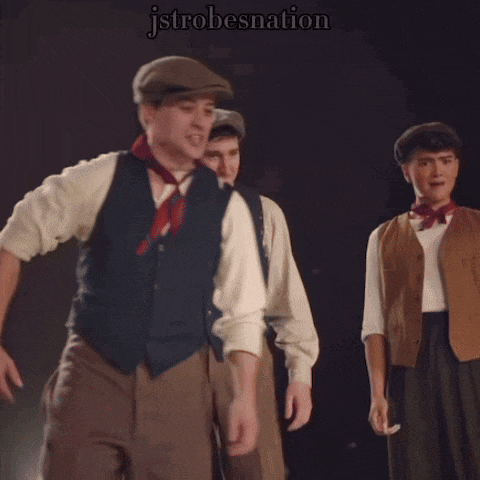 a group of men are dancing in front of a black background that says jstrbesnation