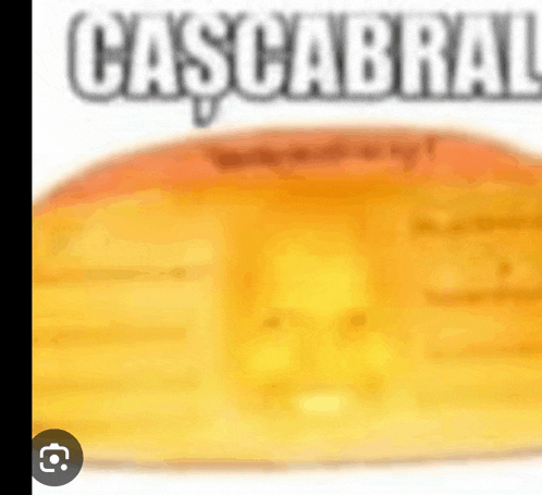 a blurred image of a yellow object with the words cascabra written on it