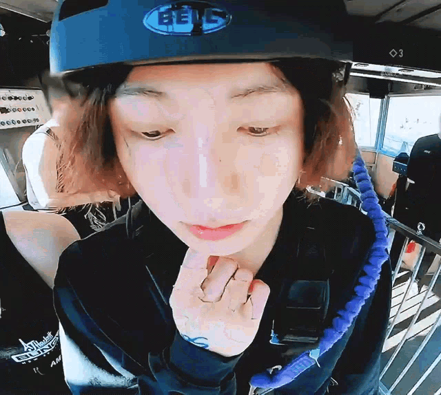 a close up of a person wearing a helmet that says bell on it