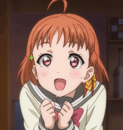 a close up of a girl 's face with a bow on her hair