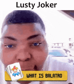 a picture of a man with a joker card in front of him