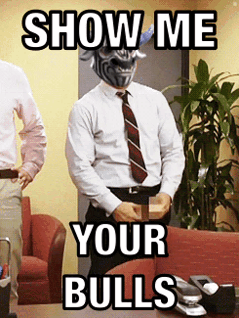 a man in a suit and tie is standing in front of a sign that says show me your bulls