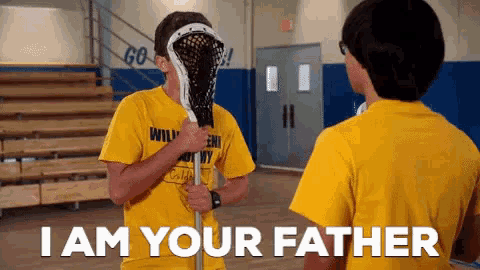 a man in a yellow shirt is holding a lacrosse stick and says " i am your father "