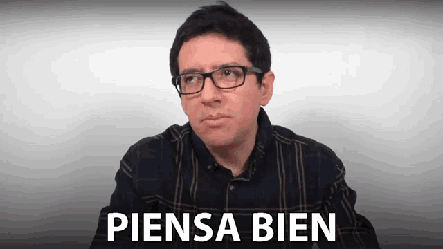 a man wearing glasses says piensa bien in spanish