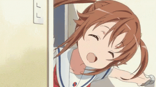 a girl in a sailor uniform is standing in a doorway