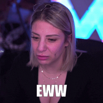 a woman wearing glasses and a black shirt has the word eww written on her face