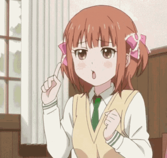 a girl in a school uniform and tie is making a funny face while pointing her finger up .