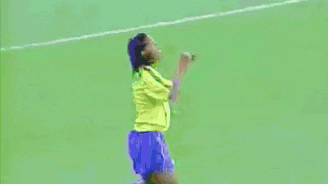 a soccer player in a yellow jersey with the number 1 on it