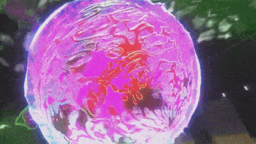 a purple sphere with a red center is surrounded by a blue sphere