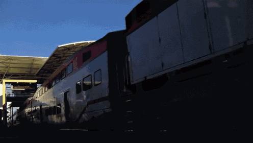 a double decker train with a cross on it