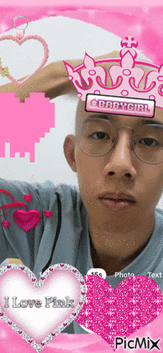 a man wearing glasses and a pink crown says i love pink