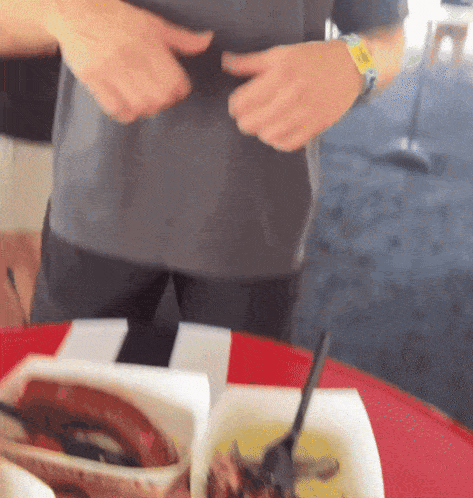 a man wearing a wristband that says ' a ' on it