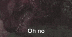 a close up of a monster 's face with the words `` oh no '' written next to it .