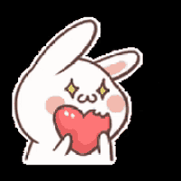 a cartoon rabbit is holding a heart in its mouth and eating it .