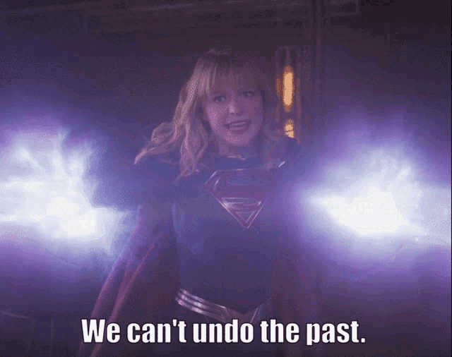 a woman in a superman costume has the words we can 't undo the past written below her