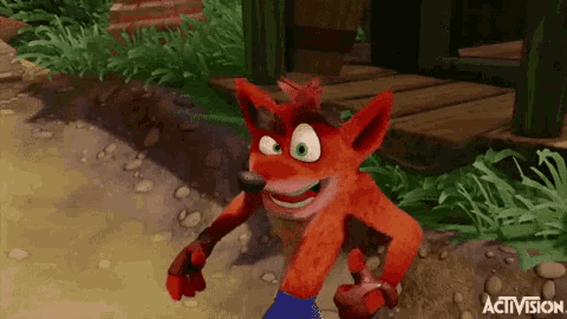 a video game character named crash bandicoot is standing on a dirt road .