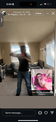 a man is taking a picture of himself in a mirror on february 13th 2024