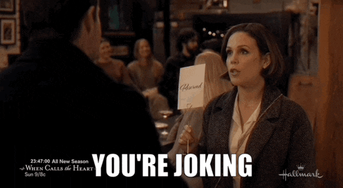 a woman says you 're joking in front of a group of people