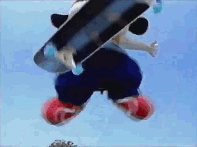 a cartoon character is jumping in the air with a skateboard on his back
