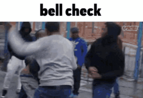a group of people are fighting on a street with the words bell check above them