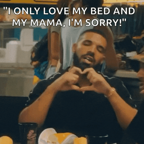 a man is making a heart shape with his hands and the words " i only love my bed and my mama i 'm sorry "