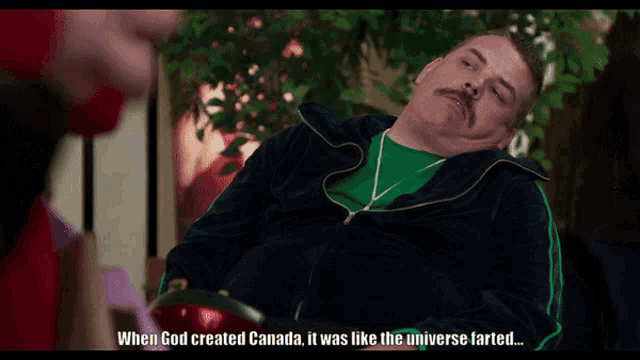 a man with a mustache is laying down with the words " when god created canada it was like the universe farted "