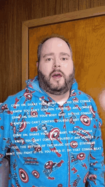 a man with a beard is wearing a captain america pajama shirt