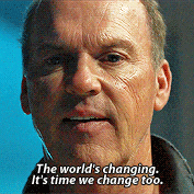 a close up of a man 's face with the words " the world 's changing it 's time we change too "