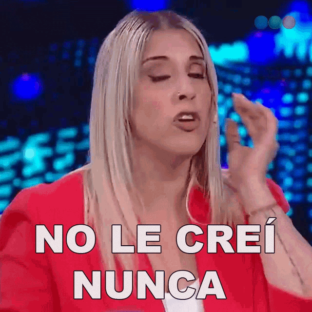 a woman in a red jacket is making a funny face and says no le crei nunca