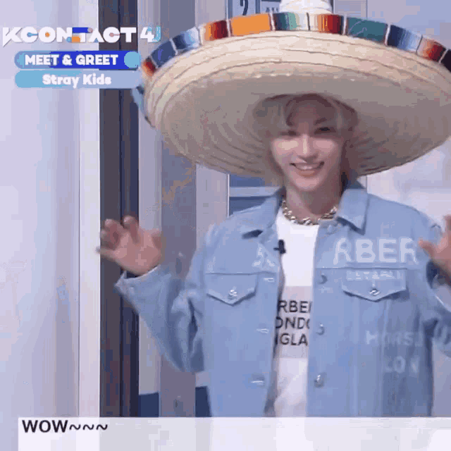 a man wearing a sombrero and a blue jacket with the words kcontact 4 on the bottom