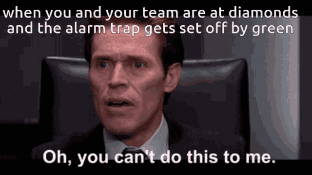 a man in a suit and tie says " oh you can 't do this to me " while sitting in front of a computer monitor