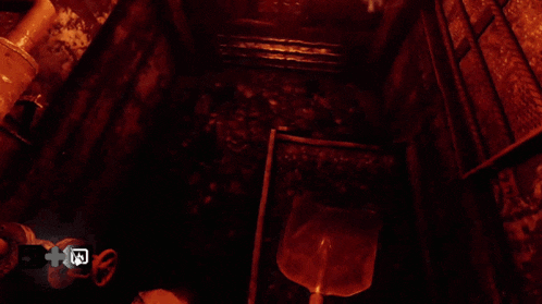 a dimly lit room with a staircase leading up to a window