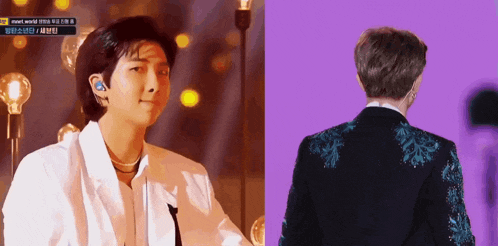 a man in a white jacket and a black jacket with a purple background