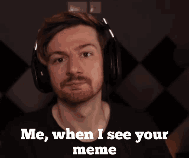 a man wearing headphones with the words me when i see your meme below him