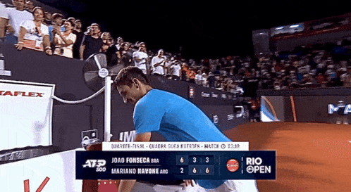 a rio open tennis match is being played in a stadium
